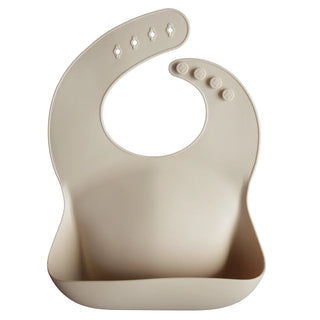 Buy shifting-sand Mushie Silicone Bib