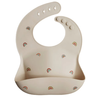 Buy rainbows Mushie Silicone Bib