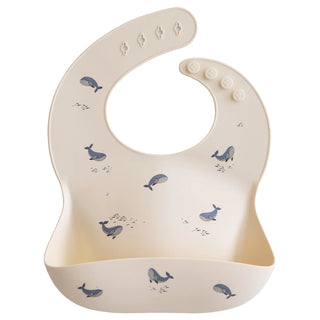 Buy whales Mushie Silicone Bib